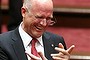 Senator David Leyonhjelm is congratulated by Senator Doug Cameron after delivering his first speech in the Senate last week.