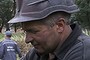 Ukrainian coal miners sift through flower fields in the grim search for remains.