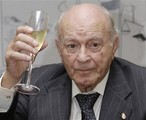 former soccer player and honorary president of Real Madrid, Alfredo Di Stefano, raises his glass during a tribute to his contribution to sport at the Argentine Embassy in Madrid. Di Stefano says he may have played football against newly elected Pope Francis when the two were children kicking balls around in the streets of Buenos Aires. Writing in his regular column in Spanish sports daily Marca, Di Stefano said he grew up in the same neighborhood as fellow Argentine Jorge Mario Bergoglio, and that his elevation to the papacy "has filled me with great joy."