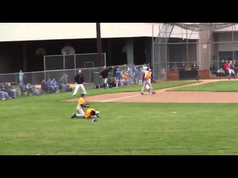 High School Baseball Players Collide During Catch