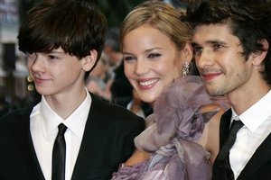 From left, British actor Thomas Sangster, Australian actress Abbie Cornish and British actor Ben Whishaw arrive for the screening of the film 'Bright Star' during the 62nd International film festival in Cannes, southern France, Friday, May 15, 2009.