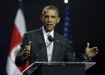 President Barack Obama gestures as he answers a question during a news conference with Costa Rica President Laura Chinchilla at the National Center for Art and Culture in San Jose, Costa Rica, Friday, May 3, 2013.