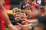 Young Essendon fans enjoy the game against Collingwood at the MCG on Sunday.