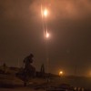 A picture taken from the southern Israeli-Gaza border shows rockets being fired from the Gaza Strip into Israel, on July 19, 2014. (Image: JACK GUEZ/AFP/Getty Images)