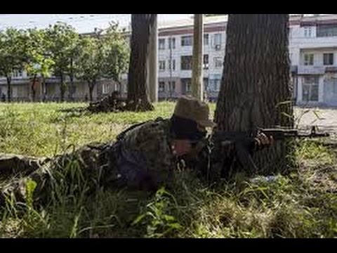 Empty streets, machine-gun nests, and rebels vowing to fight to the end.

That\'s Donetsk today as separatists turn it into a bastion they hope can withstand any Ukrainian military effort to oust them.

After being pushed out of Slovyansk on July 5, hundreds of pro-Russian fighters have fallen back to Donetsk and dug in for street warfare.

 that separatists are setting up positions at key crossroads to rake them with crossfire.
As Ukraine forces move in they need clear streets by street 

\