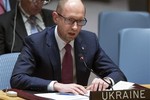 Ukrainian interim Prime Minister Arseniy Yatsenyuk speaks during an U.N. Security Council meeting on the Ukraine crisis at the United Nations headquarters, Thursday, March 13, 2014. Yatsenyuk, during a meeting with President Barack Obama on Wednesday, declared in English that his government was "absolutely ready and open for talks with the Russian Federation" and urged Moscow to "start the dialogue" without guns and tanks.