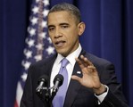 President Barack Obama gestures during a news conference.