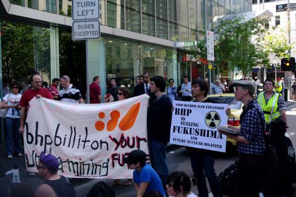 Placard linking BHP and Fukushima