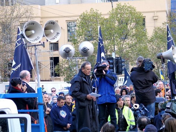 Father Peter Norden of Melbourne University Law School led a minute's silence