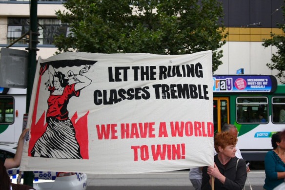 "Let the ruling classes tremble ..." banner at one of the stalls