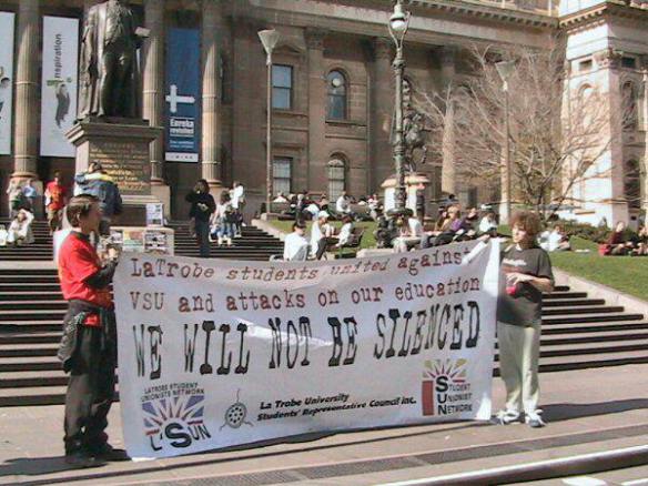 LaTrobe University students with banner - We will not be silenced