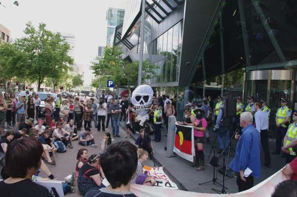 Dave Sweeney and protester occupying road