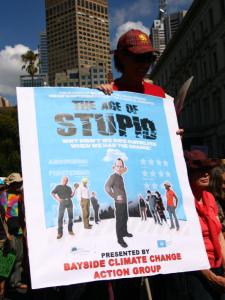 Modified 'Age of Stupid' poster with head of Tony Abbott