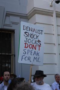 Placard - 'Denialist Shock Jocks Don't Speak for Me'