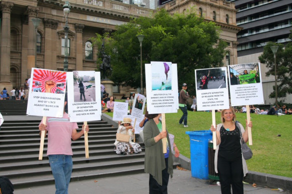 Placards demanding equality for women in Iran