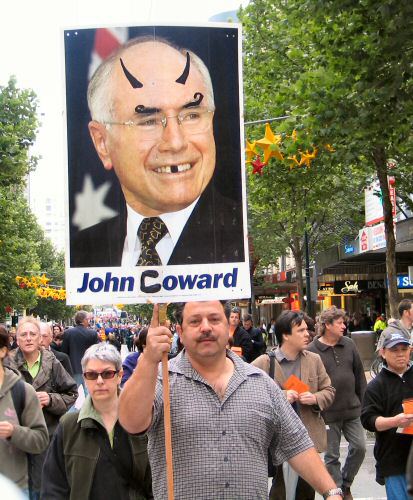 Portait of Howard with added horns  etc, captioned 'John Coward'