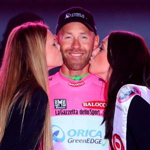 Svein Tuft celebrates after Orica GreenEDGE won the Team Time Trial and he won the pink jersey after the opening stage the of the 2014 Giro D'Italia in Belfast