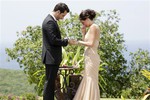 This publicity image released by ABC shows Chris Siegfried, left, placing a ring on the finger of Desiree Hartsock during the final rose ceremony on the romance competition series "The Bachelorette," on the season finale that aired Monday, Aug. 5, 2013 on ABC.