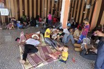 Displaced Iraqis in the town of Kalak, Iraq, Thursday, Aug. 7, 2014