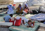 Displaced Iraqis from the Yazidi community settle at the Qandil mountains near the Turkish border outside Zakho, 300 miles (475 kilometers) northwest of Baghdad, Iraq, Saturday, Aug. 16, 2014.