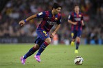 Barcelona's Luis Suarez, from Uruguay, controls the ball during the Joan Gamper trophy friendly soccer