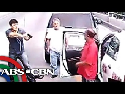 Man points gun on taxi driver in road rage