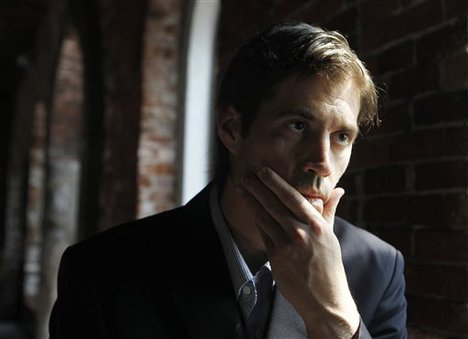 In this Friday, May 27, 2011, file photo, journalist James Foley responds to questions during an interview with The Associated Press, in Boston.