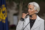 International Monetary Fund (IMF) Managing Director Christine LaGarde makes a statement about sanctions leveled against Russia, during a news conference following an IMF Executive Board meeting at IMF Headquarters in Washington, Wednesday, April 30, 2014.