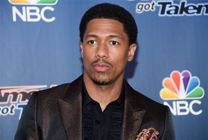 Host Nick Cannon arrives at the "America's Got Talent" pre-show red carpet at Radio City Music Hall on Tuesday, July 29, 2014, in New York.