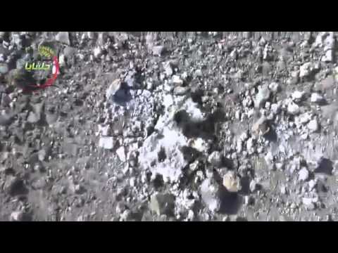 20130518  Hama - Halfaya - air strike on town - 3 - Crater with still smolding phosphorus