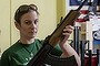 Tracy Earlenbaugh shows a Russian AK-47 at TW Firearms in Leesburg, Virginia on August 22. After the Obama administration added the machine gun to sanctions against Russia for its actions in Ukraine, gun dealers reported a massive jump in sales of the weapon.