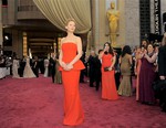 File - Jennifer Lawrence arrives at the Oscars on Sunday, March 2, 2014, at the Dolby Theatre in Los Angeles.