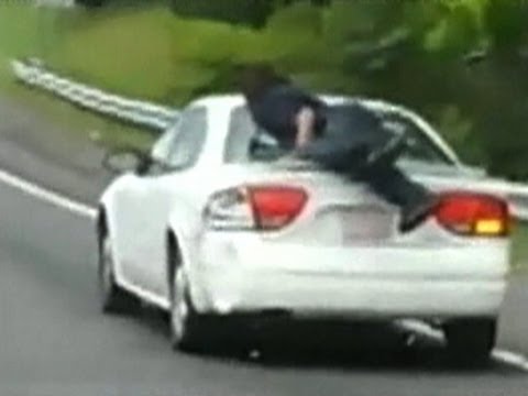 Raw: Man Seen Clinging to Trunk on NC Highway