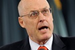 Treasury Secretary Henry Paulson speaks during a news conference at the Treasury Department in Washington, Nov. 12,