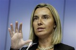 Italy's Foreign Minister Federica Mogherini addresses the media during an EU summit in Brussels, Saturday, Aug. 30, 2014. European Union leaders have nominated Italian Foreign Minister Federica Mogherini to become the 28-nation bloc's new foreign policy chief for the next five years. The EU leaders also elected Polish Prime Minister Donald Tusk to succeed European Council President Herman Van Rompuy in December as EU summit chairman and behind-the-scenes broker of compromises among national leaders.