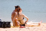 Beach - sun bathing - tourists - Singapore