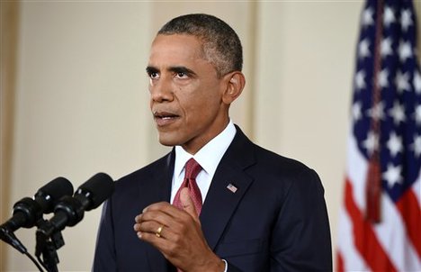 President Barack Obama addresses the nation from the Cross Hall in the White House in Washington, Wednesday, Sept. 10, 2014. In a major reversal, Obama ordered the United States into a broad military campaign to “degrade and ultimately destroy” militants in two volatile Middle East nations, authorizing airstrikes inside Syria for the first time, as well as an expansion of strikes in Iraq.