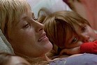 Let the growth begin... Single-mum Olivia (Patricia Arquette) reads a story to her son Mason (Ellar Coltrane) and daughter Samantha (Lorelei Linklater) at the start of <i>Boyhood</i>.