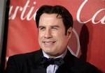 Actor John Travolta arrives at the 19th annual Palm Springs International Film Festival Awards Gala in Palm Springs, Calif., Saturday, Jan. 5, 2008.