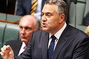 CANBERRA, AUSTRALIA - MAY 13: Treasurer Joe Hockey delivers his first budget speech in the House of Representatives at Parliament House on May 13, 2014 in Canberra, Australia. Tony Abbott's Coalition government will deliver it's first federal budget tonight and is expected to reveal several welfare spending cuts and tax increases as well as increases in defence and infrastructure spending. (Photo by Stefan Postles/Getty Images)