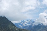 Distant mountains catch the sunlight between Rothang and Sissu in H.P, India on the 18th August 2010.