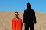 This image made from video posted on the Internet by Islamic State militants and provided by the SITE Intelligence Group, a U.S. terrorism watchdog, on Saturday, Sept. 13, 2014, purports to show British aid worker David Haines before he was beheaded. The video emerged hours after the family of Haines issued a public plea on Saturday urging his captors to contact them. The 44-year-old Haines was abducted in Syria in 2013 while working for an international aid agency.