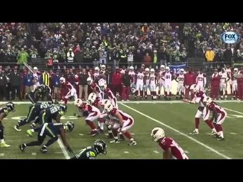 Seahawks Head Coach Pete Carroll teaches rugby tackling