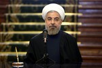 Iranian President Hassan Rouhani attends a joint press conference with his Azeri counterpart Ilham Aliyev after their meeting at the Saadabad Palace in Tehran, Iran, Wednesday, April 9, 2014.