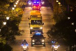 A convoy transporting a Spanish nurse who is believed to have contracted the ebola virus from a 69-year-old Spanish priest leaves Alcorcon Hospital in Madrid, Spain, Tuesday, Oct. 7, 2014.