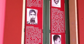 Photos of political prisoners detained at San Carlos between 1960-1979,  on a wall of the former prison in an exhibit maintained