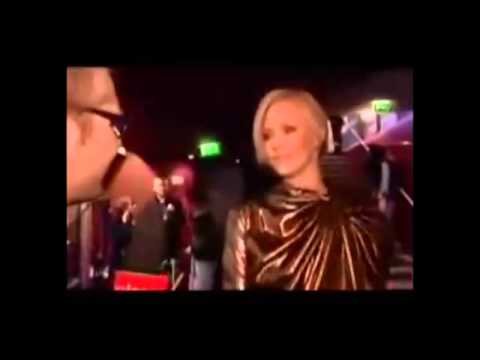 Charlize Theron speaking Afrikaans with Dutch speaking Belgian reporter