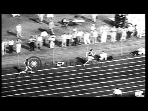 Athletes set new record at the National Collegiate Athletic Association Track Mee...HD Stock Footage