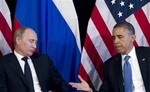 President Barack Obama holds out a hand to shake to Russia’s President Vladimir Putin during a bilateral meeting at the G20 Summit