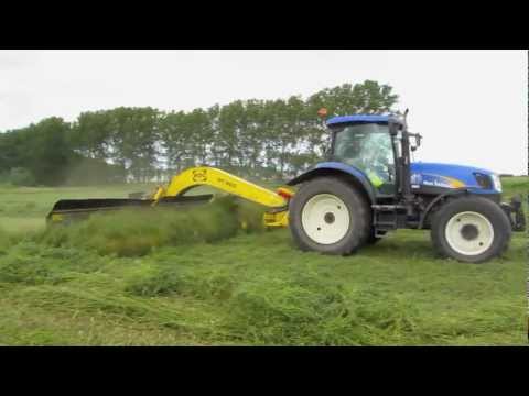 New Holland TS125A + ROC RT 950 Bandhark - Continuous merger